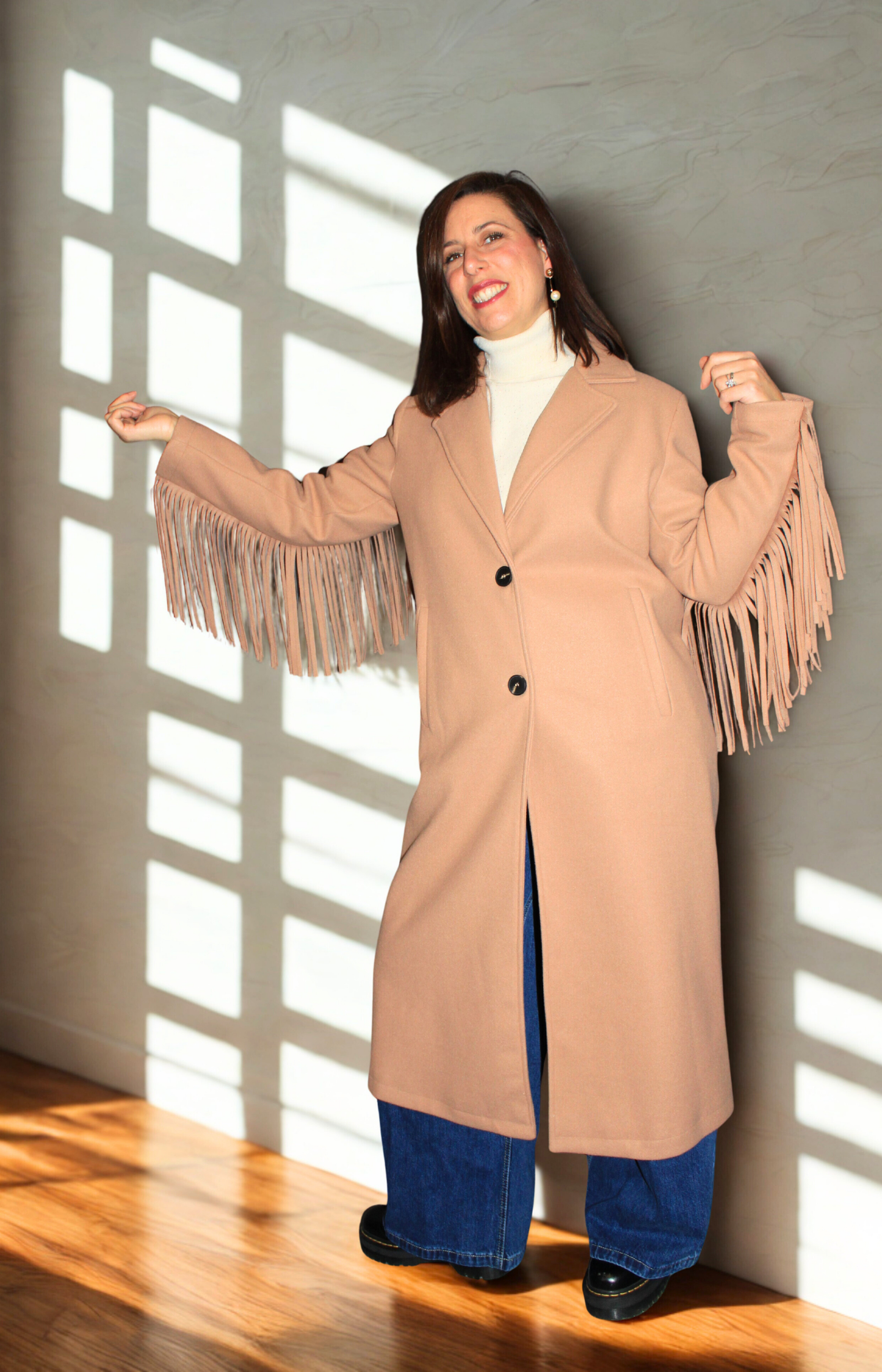 Cappotto donna con frange elegante e moderno