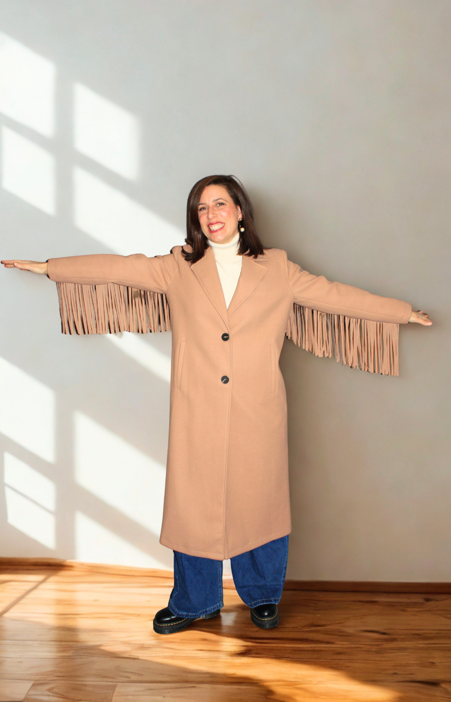Cappotto donna con frange elegante e moderno
